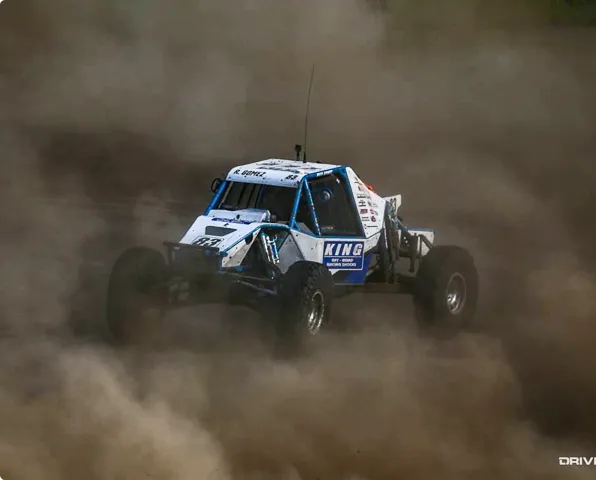 blue_king_buggy_in_dust nitto_buggy_rocks
