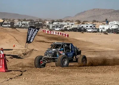 dirt_track_turn_blue_buggy